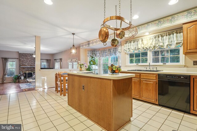 1728 Catherine Fran Dr, Accokeek, MD 20607 - kitchen featuring a center island, light tile patterned floors, dishwasher, and light countertops