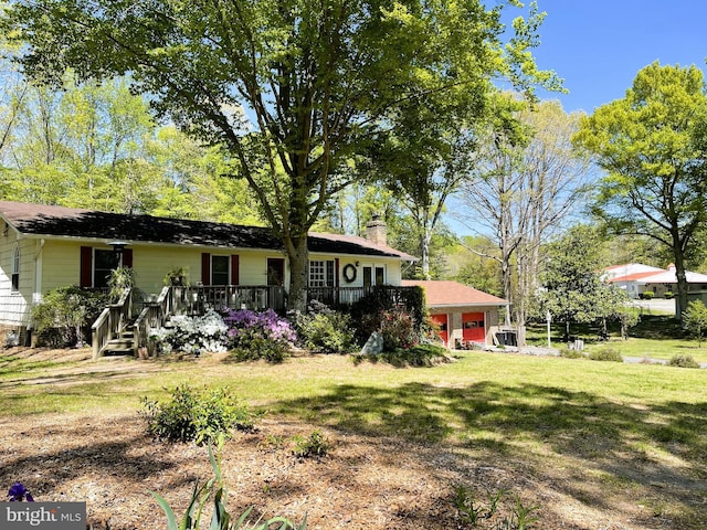 41 Wood Landing Rd, Fredericksburg, VA 22405 - back of property with a chimney and a lawn