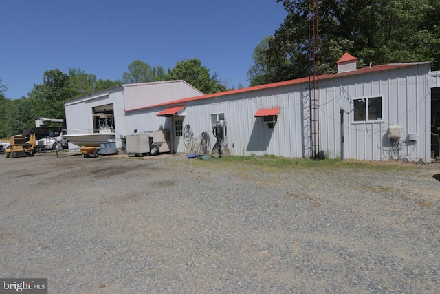 41 Wood Landing Rd, Fredericksburg, VA 22405 - rear view of house featuring a garage