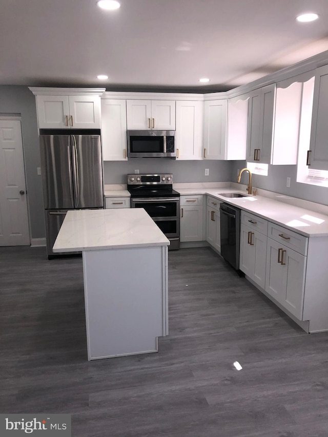 278 W Wellens Ave, Philadelphia, PA 19120 - kitchen featuring recessed lighting, stainless steel appliances, a kitchen island, and a sink