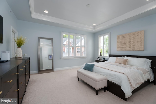 bedroom featuring crown molding, baseboards, light colored carpet, recessed lighting, and a raised ceiling