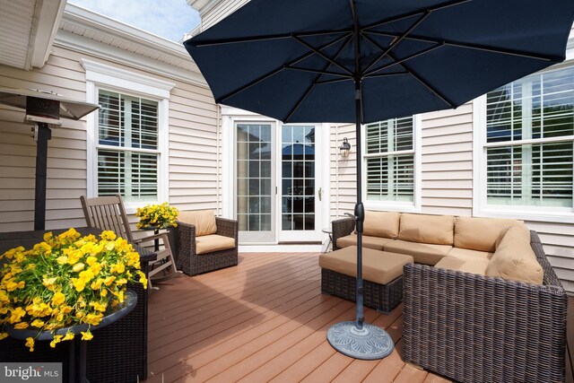 deck featuring an outdoor living space
