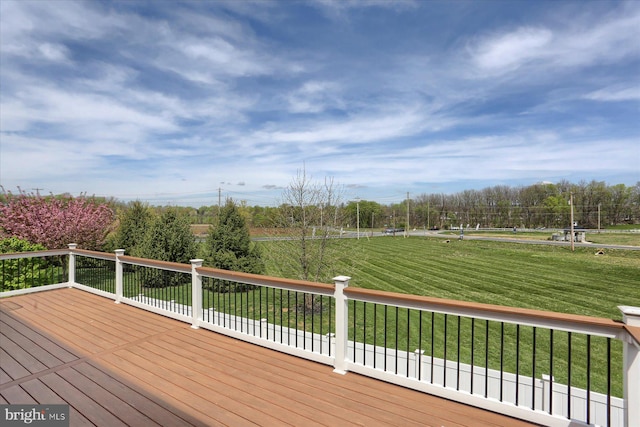 deck featuring a lawn