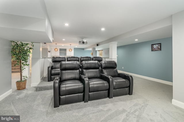 home theater with recessed lighting, baseboards, light colored carpet, and bar