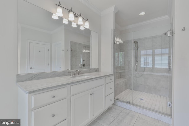 bathroom with recessed lighting, tile patterned flooring, a shower stall, vanity, and ornamental molding