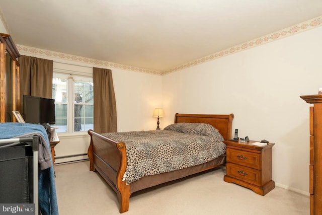 bedroom featuring baseboards, a baseboard heating unit, and light colored carpet