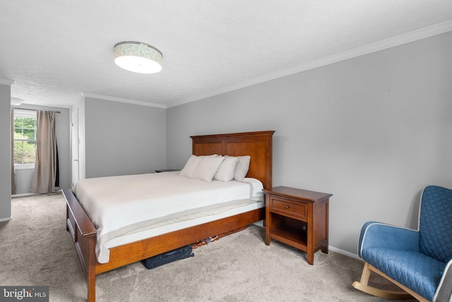 bedroom with light colored carpet, ornamental molding, baseboards, and a textured ceiling