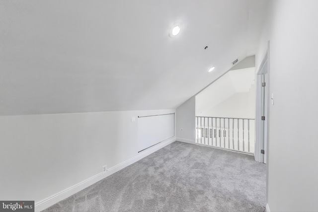 bonus room featuring carpet floors, recessed lighting, baseboards, and vaulted ceiling