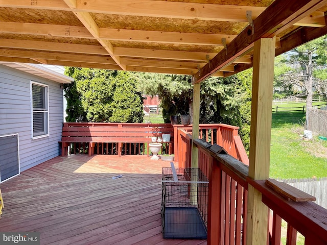 wooden deck with fence and a yard