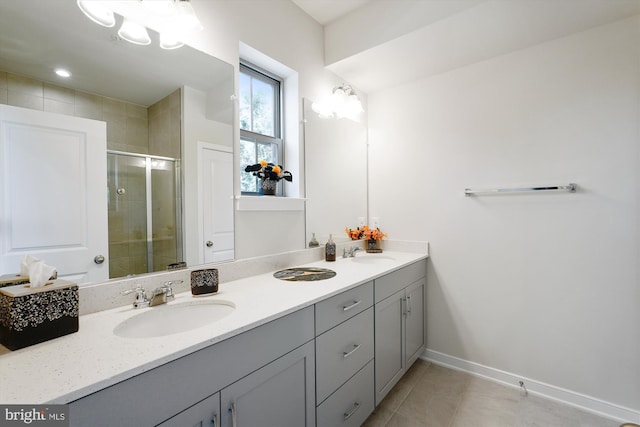 45918 Swallow Ter, Sterling, VA 20165 - bathroom with double vanity, a shower stall, and tile patterned flooring