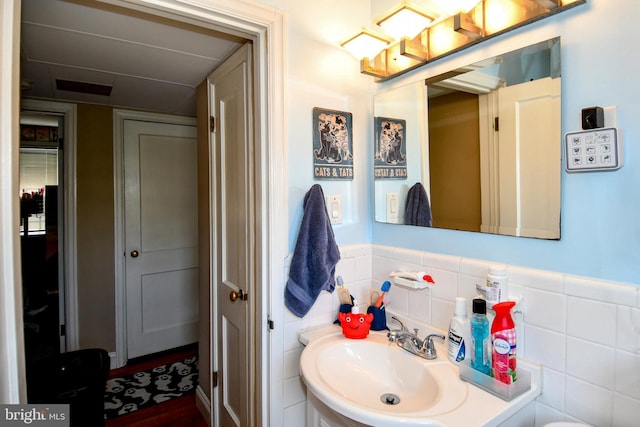 1303 Belle View Blvd Unit B1, Alexandria, VA 22307 - bathroom with a sink and wood finished floors