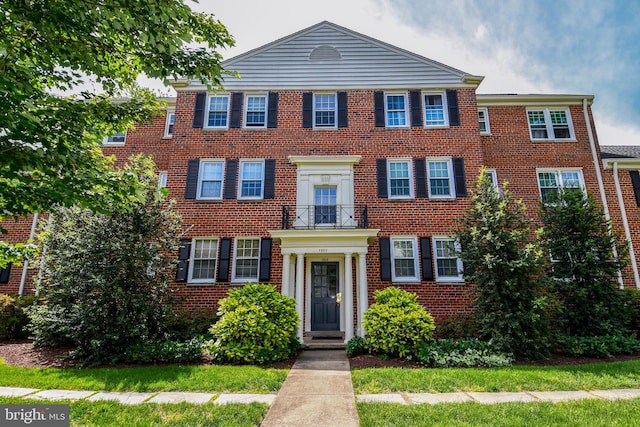 1303 Belle View Blvd Unit B1, Alexandria, VA 22307 - view of front of property with brick siding and a balcony