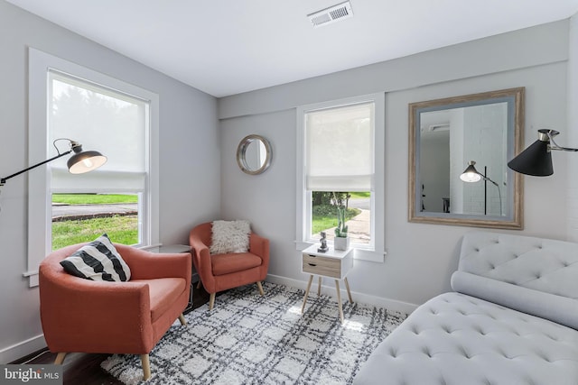 sitting room featuring baseboards