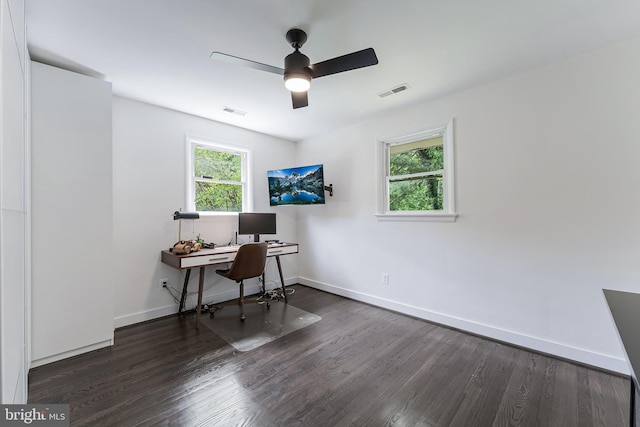 home office featuring ceiling fan, healthy amount of natural light, and wood finished floors