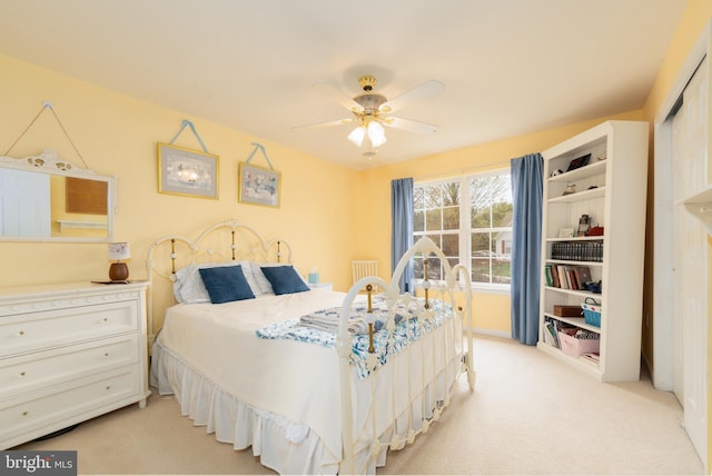 bedroom featuring light carpet
