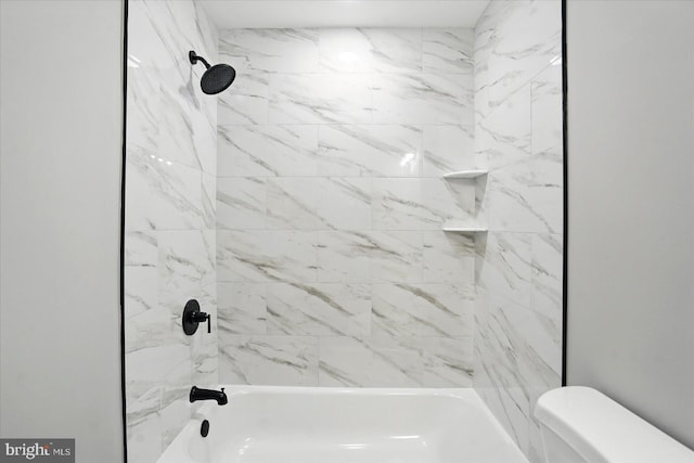 full bath featuring toilet and  shower combination