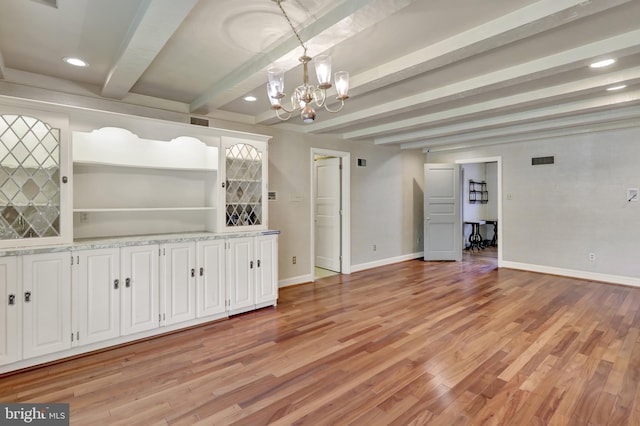 237 Endlich Ave, Reading, PA 19606 - unfurnished living room with a chandelier, beam ceiling, light wood-style flooring, and recessed lighting