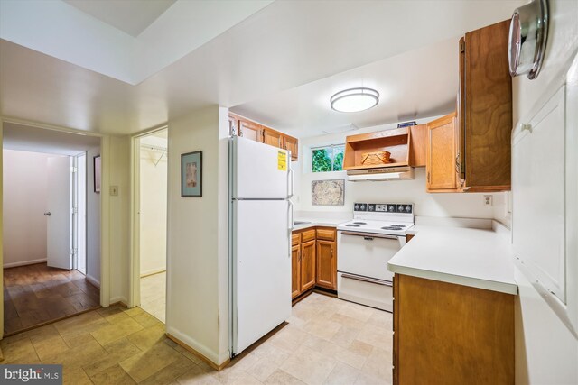 kitchen with open shelves, brown cabinetry, white appliances, light countertops, and baseboards