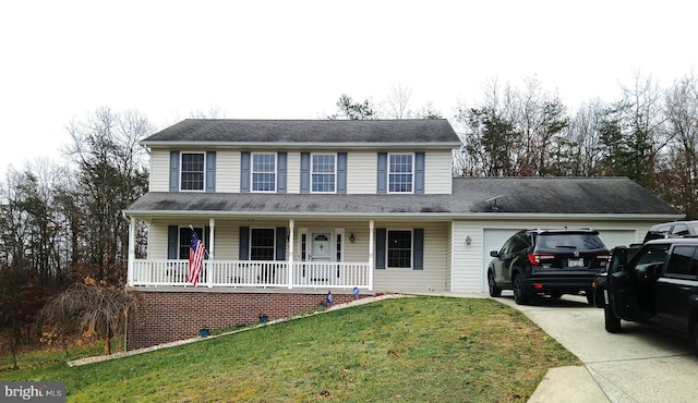 view of front of home featuring covered porch, an attached garage, driveway, and a front lawn