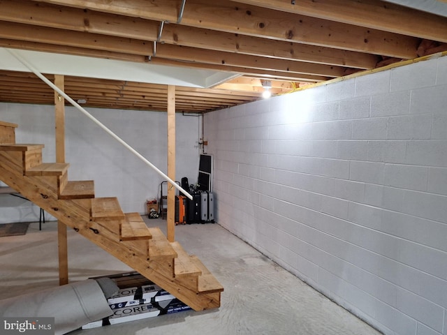basement featuring stairway