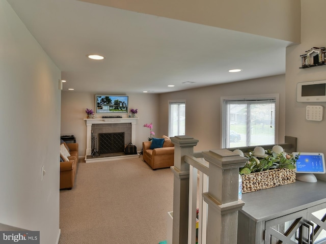8362 Inspiration Ave, Walkersville, MD 21793 - carpeted living room with a fireplace with raised hearth and recessed lighting