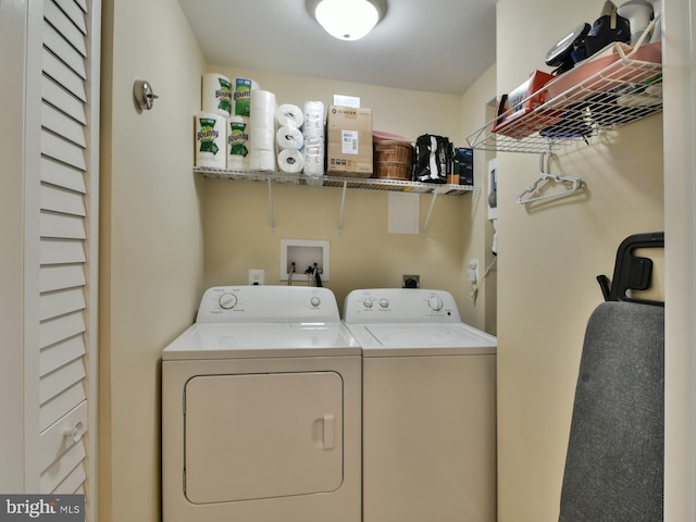 8362 Inspiration Ave, Walkersville, MD 21793 - laundry room featuring separate washer and dryer and laundry area