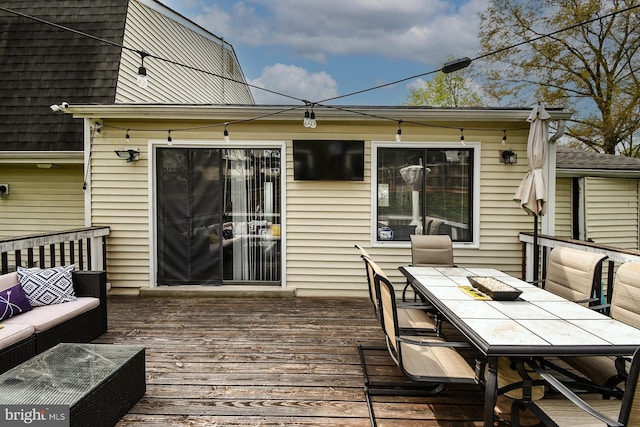 8362 Inspiration Ave, Walkersville, MD 21793 - deck with outdoor dining area and an outdoor living space