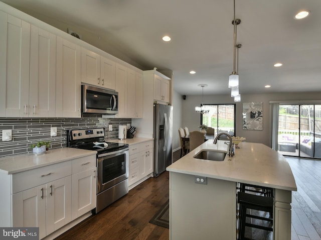 8362 Inspiration Ave, Walkersville, MD 21793 - kitchen with a sink, a center island with sink, backsplash, beverage cooler, and appliances with stainless steel finishes