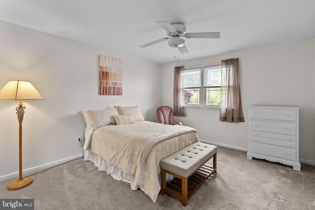bedroom featuring carpet, baseboards, and a ceiling fan
