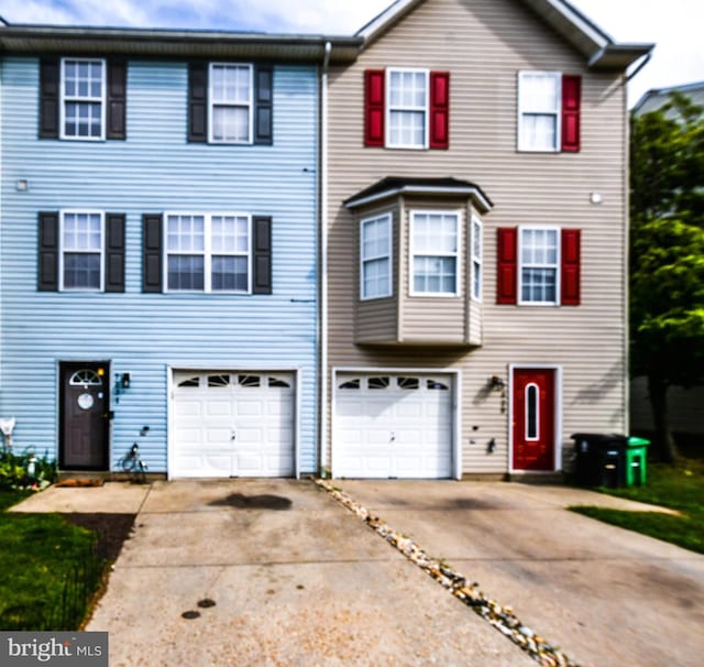 7031 Migliori Ct, District Heights, MD 20747 - view of front facade featuring concrete driveway and an attached garage