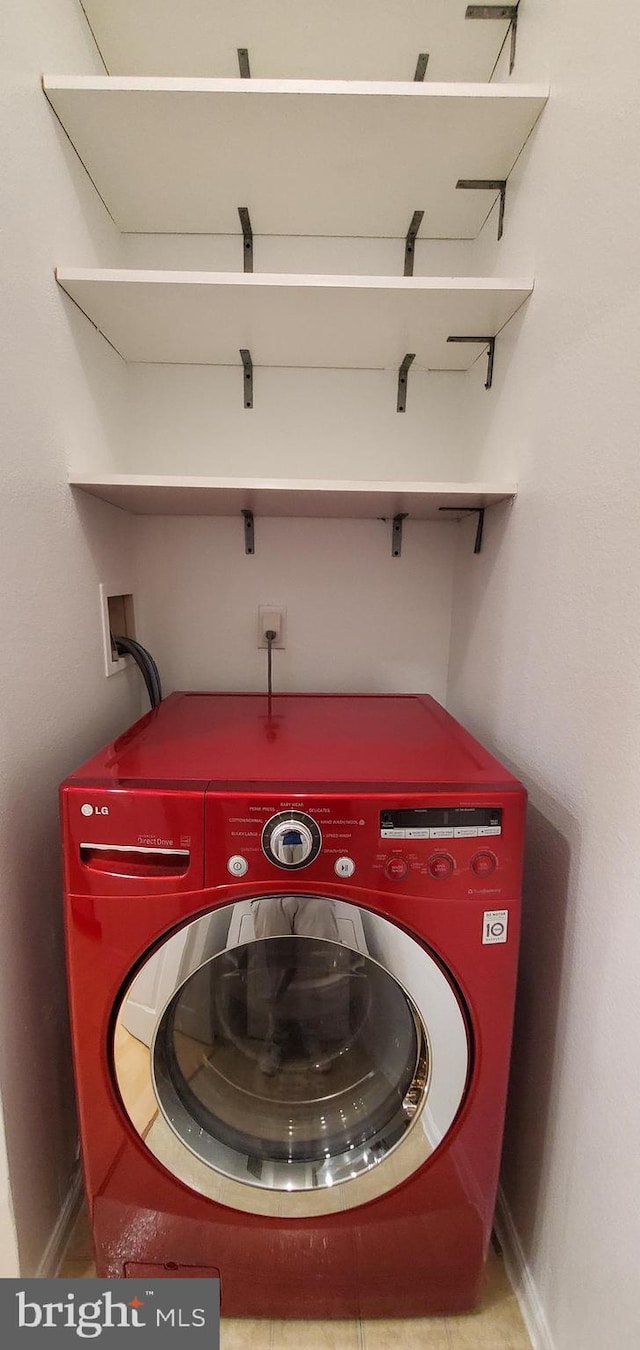 11800 Old Georgetown Unit 1103, Rockville, MD 20852 - washroom with washer / dryer and baseboards