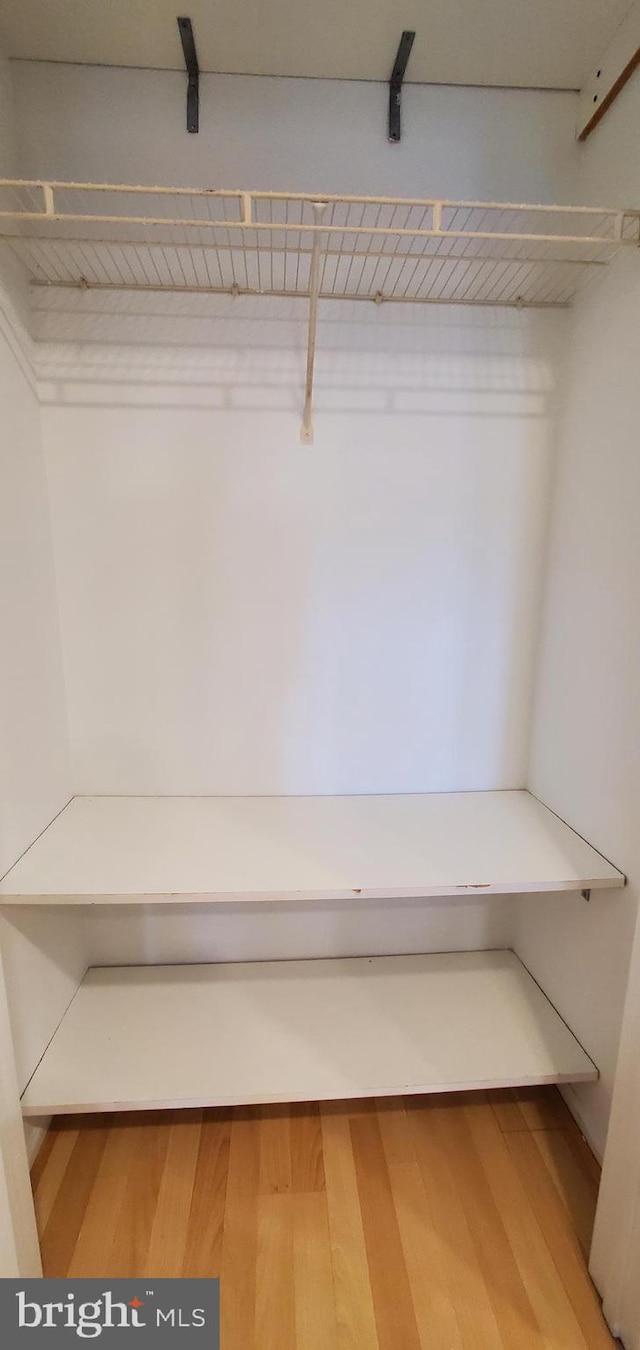 11800 Old Georgetown Unit 1103, Rockville, MD 20852 - walk in closet featuring wood finished floors