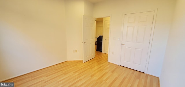 11800 Old Georgetown Unit 1103, Rockville, MD 20852 - unfurnished bedroom featuring light wood-style flooring and baseboards
