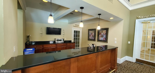 11800 Old Georgetown Unit 1103, Rockville, MD 20852 - kitchen featuring beam ceiling, stainless steel microwave, dark countertops, and pendant lighting