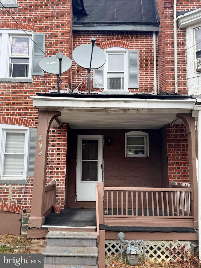 205 E 24th St, Wilmington, DE 19802 - entrance to property with brick siding and covered porch