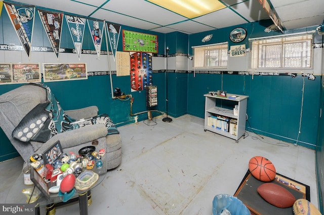 miscellaneous room featuring unfinished concrete flooring