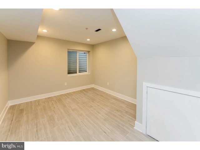 bonus room featuring visible vents, recessed lighting, light wood finished floors, and baseboards