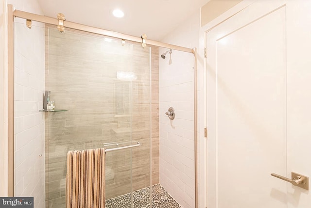 full bath featuring recessed lighting and a stall shower