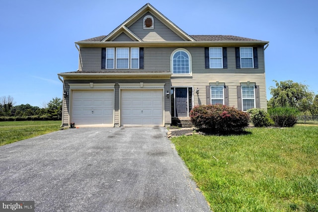 170 Otter Way, Frederica, DE 19946 - view of front of property with driveway, a garage, and a front lawn