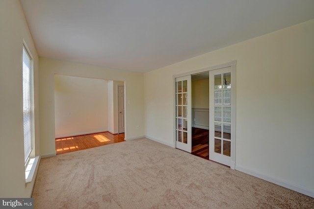170 Otter Way, Frederica, DE 19946 - carpeted spare room with french doors and baseboards