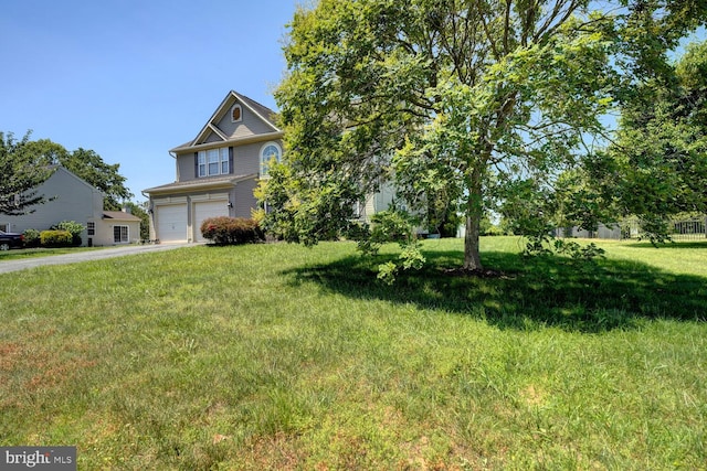 170 Otter Way, Frederica, DE 19946 - view of front of property with a garage, driveway, and a front lawn