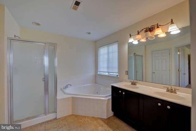 170 Otter Way, Frederica, DE 19946 - bathroom with a stall shower, double vanity, a tub with jets, and tile patterned flooring
