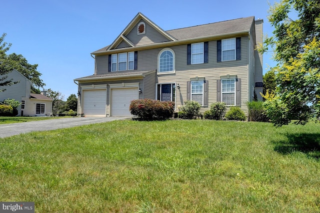 170 Otter Way, Frederica, DE 19946 - view of front of property with a garage, driveway, a front yard, and a chimney