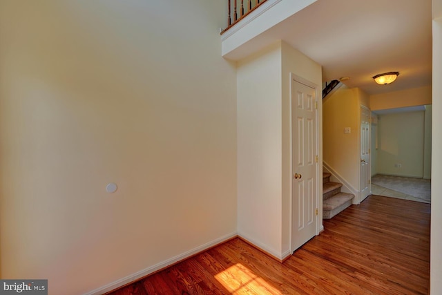 170 Otter Way, Frederica, DE 19946 - corridor featuring wood finished floors and stairway