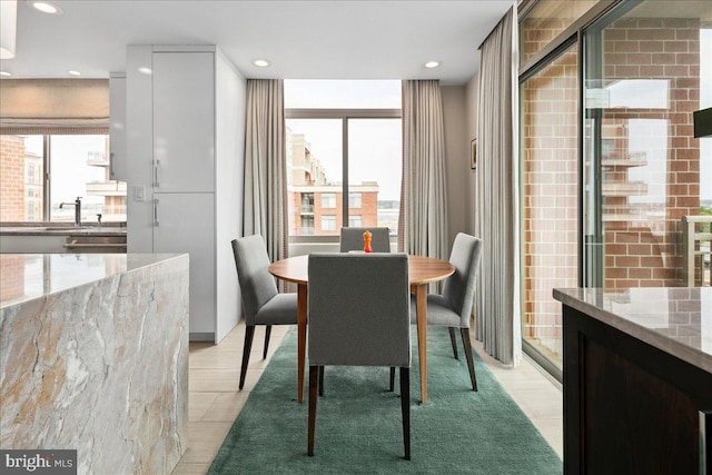 dining area featuring a wealth of natural light and recessed lighting