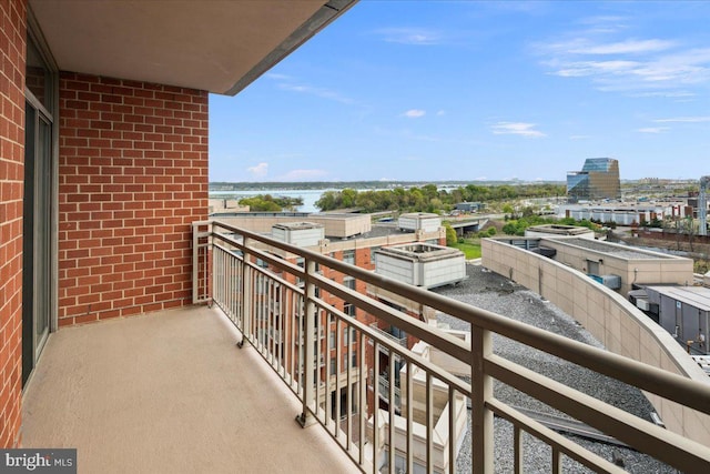balcony featuring a water view