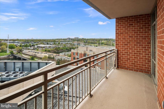 balcony with a city view and a water view