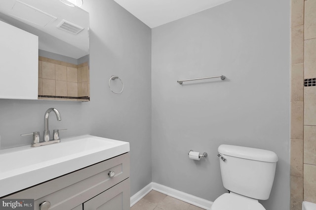 3906 Bel Pre Rd Unit 3906-1, Silver Spring, MD 20906 - full bath with toilet, tile patterned floors, visible vents, baseboards, and vanity