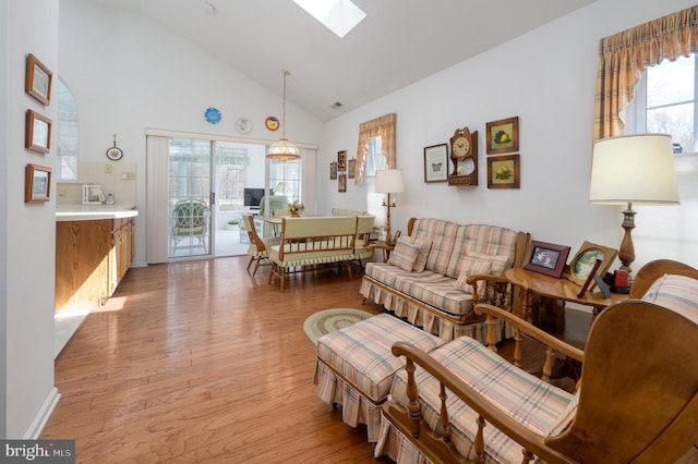 737 Cascade, Mount Laurel, NJ 08054 - living room with a skylight, light wood-style flooring, and high vaulted ceiling