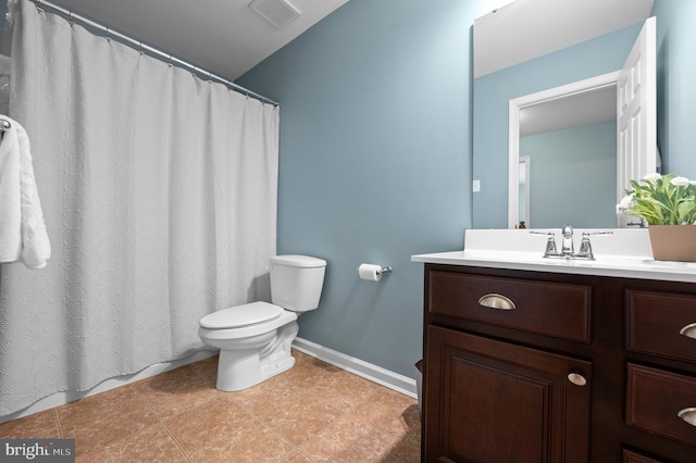 bathroom featuring vanity, visible vents, toilet, baseboards, and a shower with curtain
